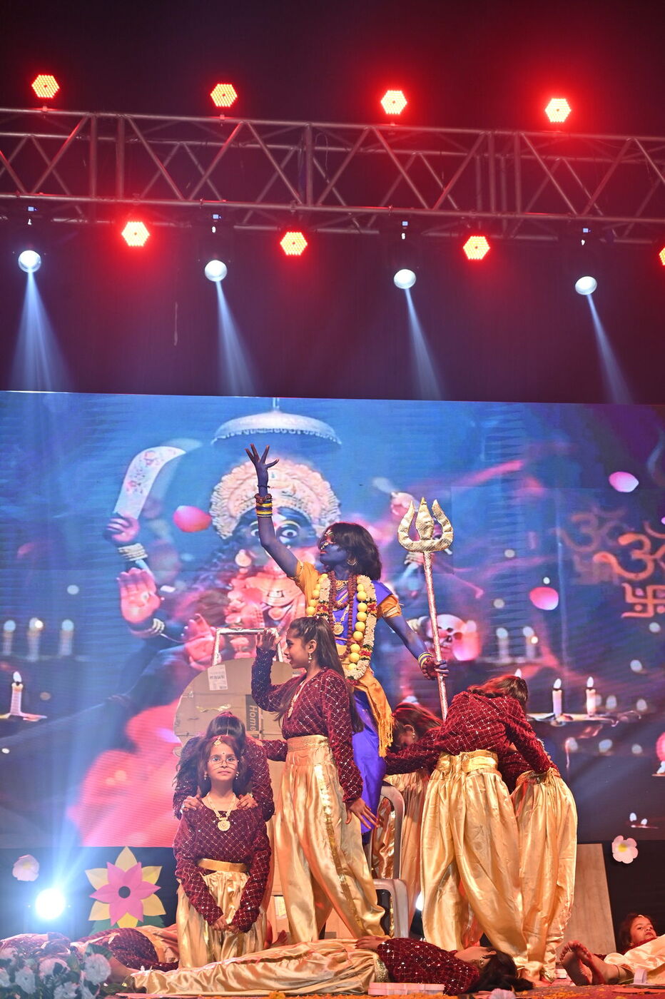 Students present a Durga tableau on stage at Sparkle 2025