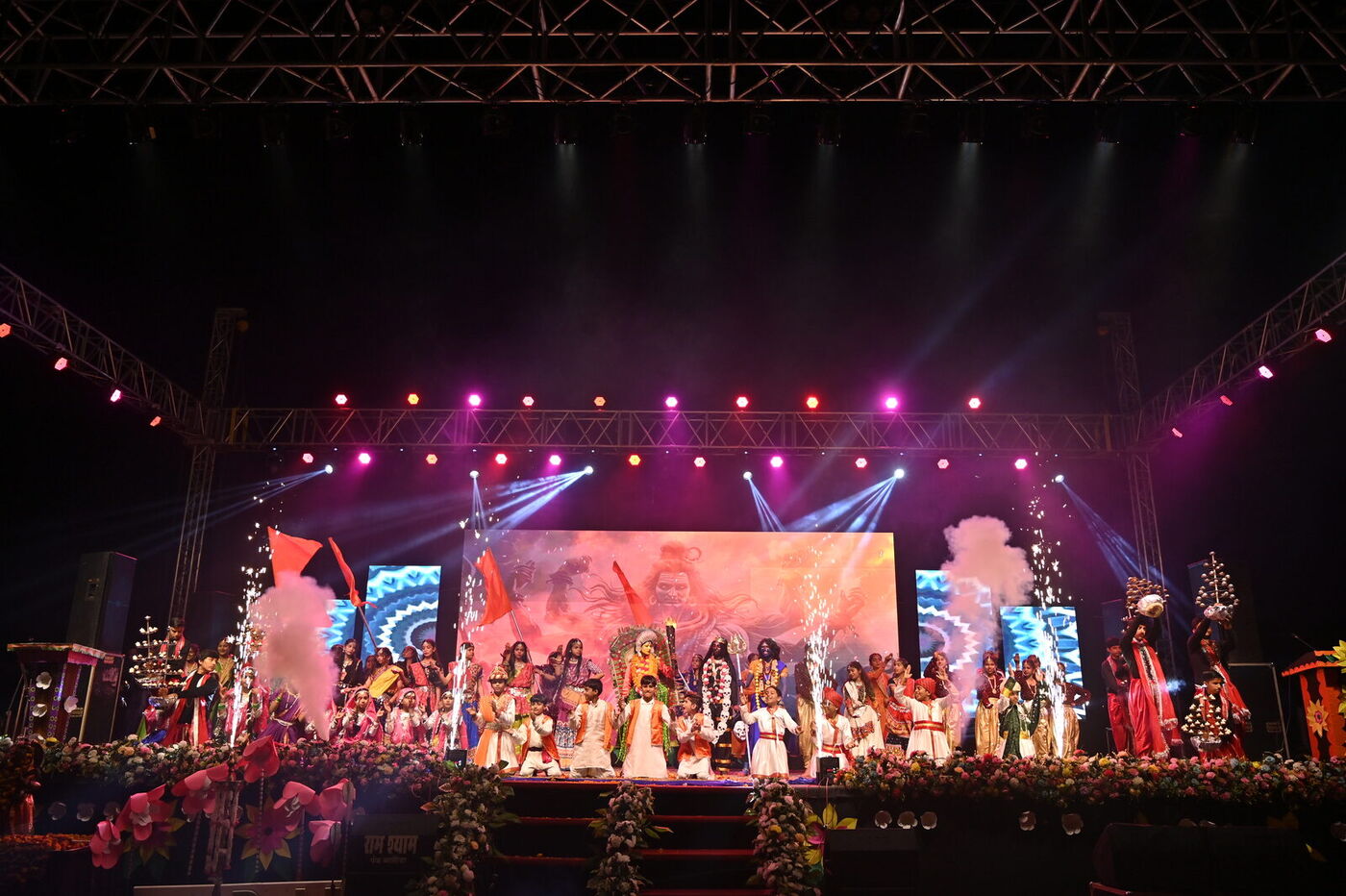 The grand finale ensemble on the illuminated annual concert stage